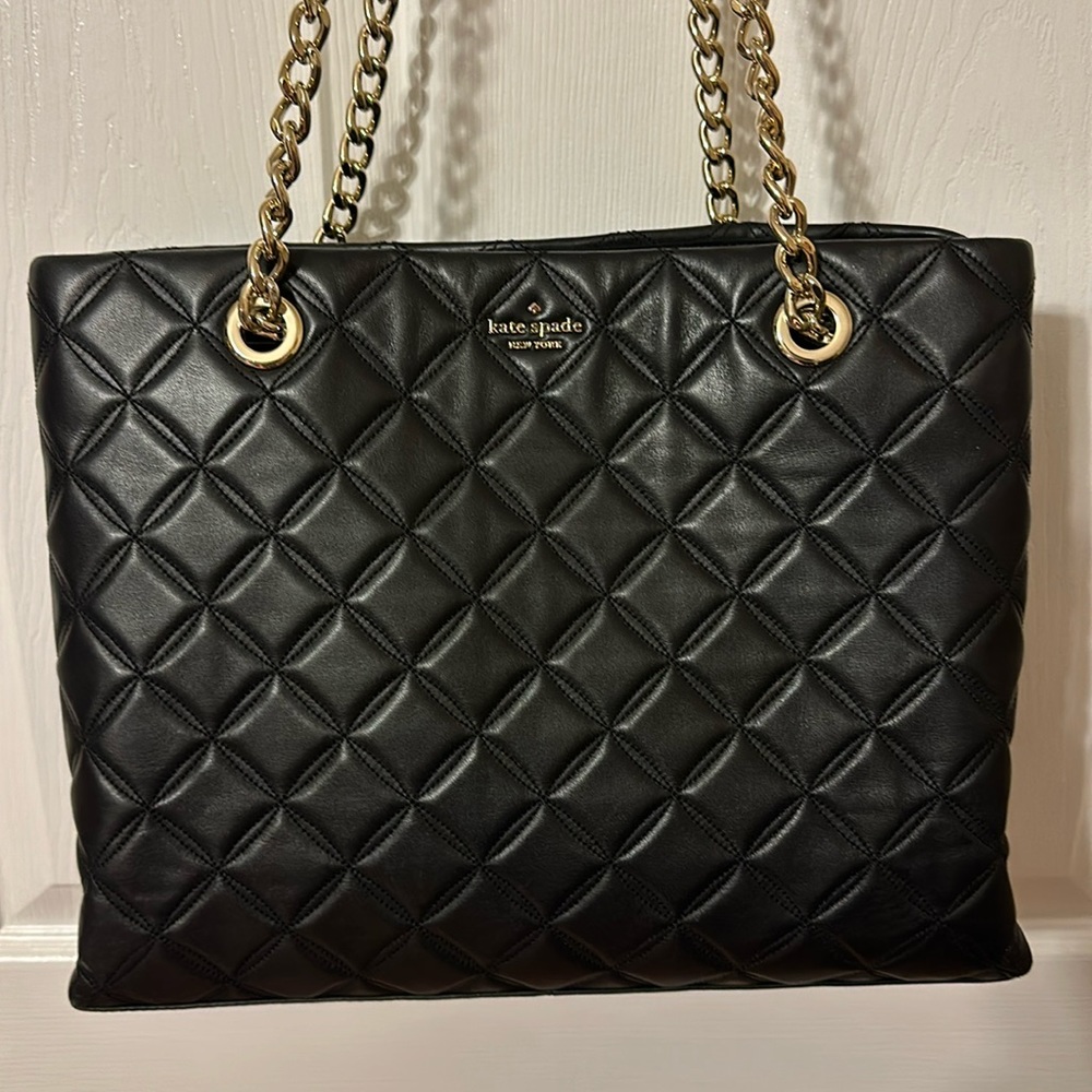 Stunning Kate Spade purse.  Black on black with gold features